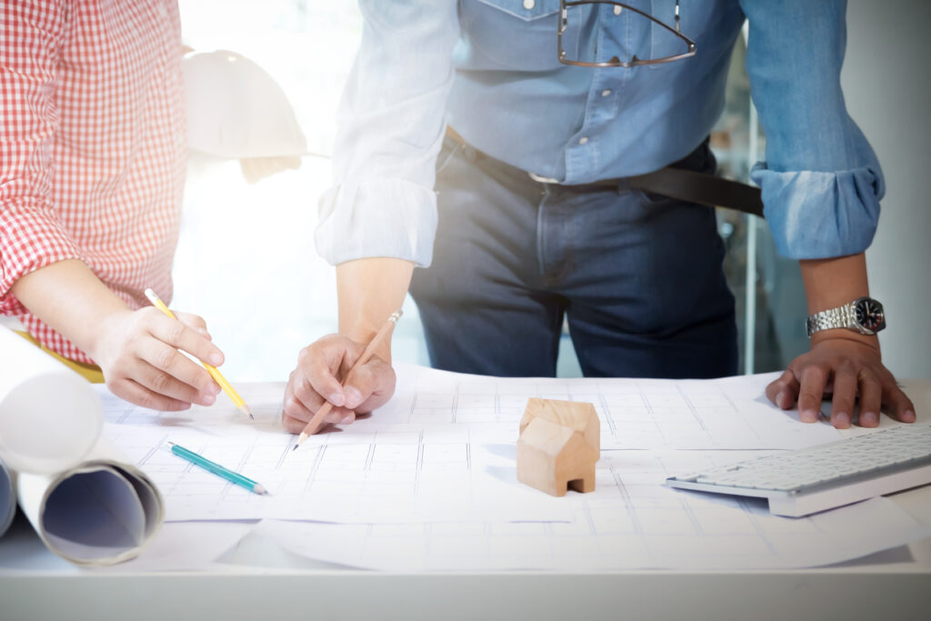 Engineer meeting for architectural project.